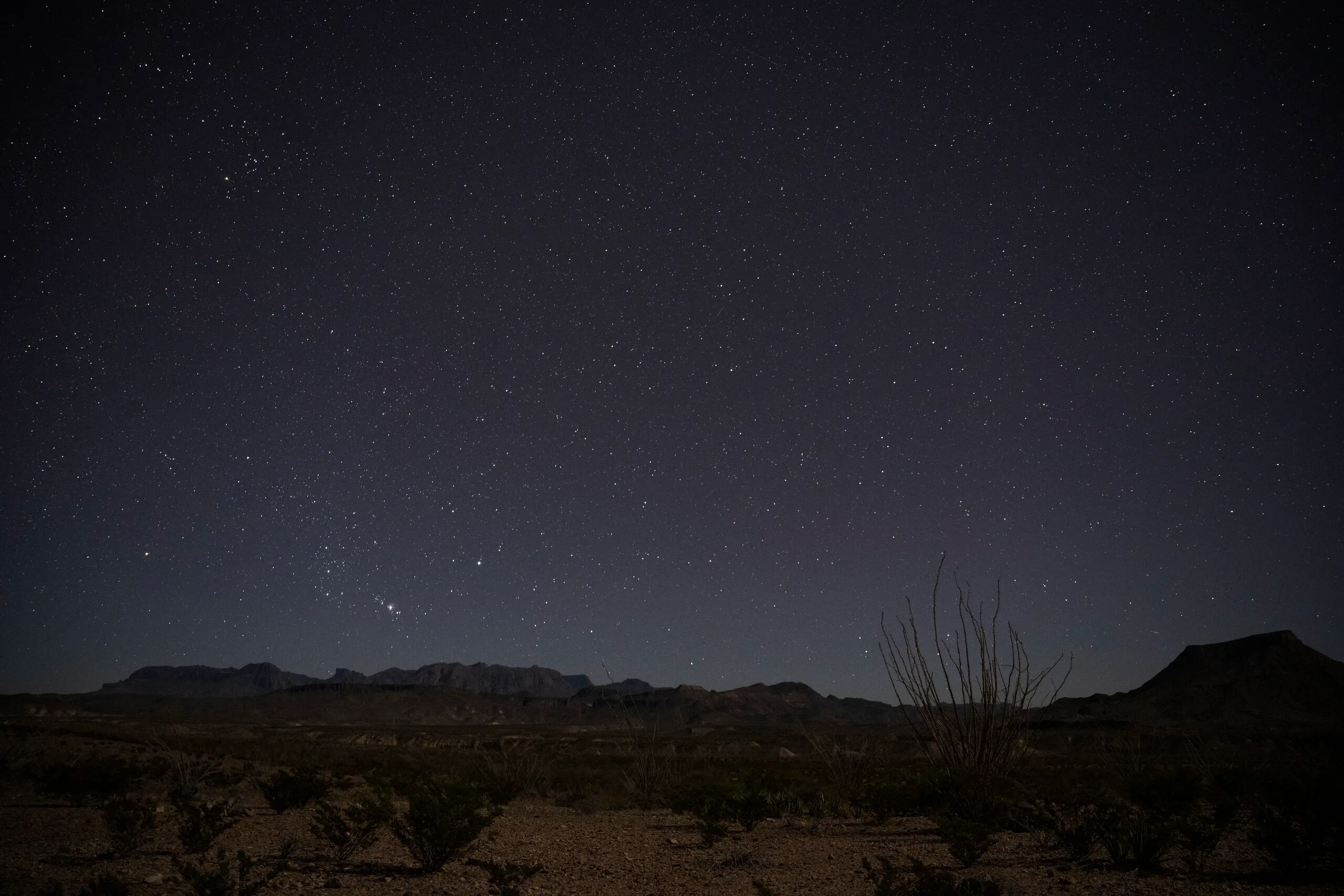 Stars are seen above the Chisos Mountains Sunday, Dec. 17, 2023, in Big Bend National Park. Eli Hartman/The Texas Tribune