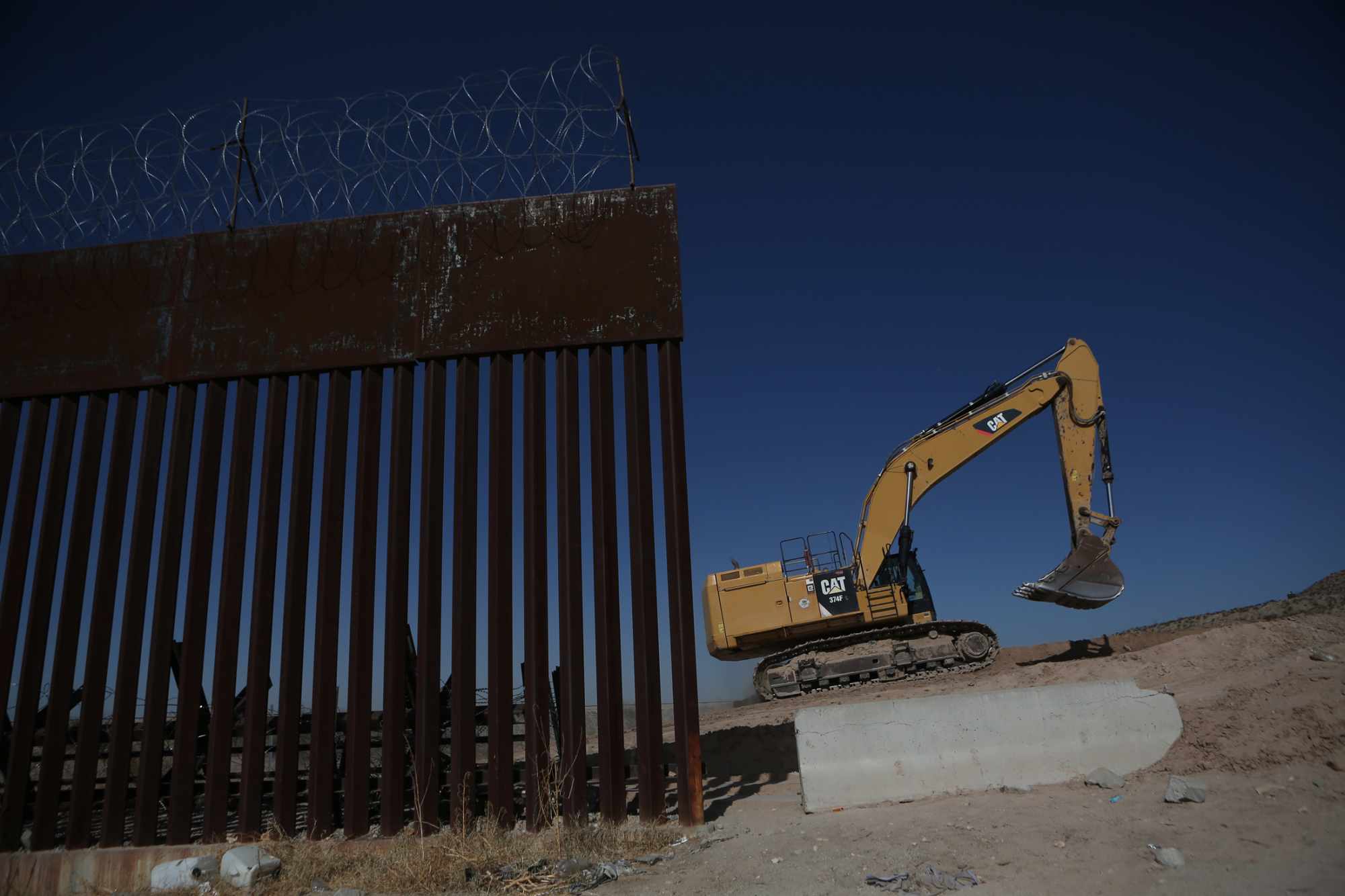Construction crews work on a new section of the border wall between Sunland Park, New Mexico, and Ciudad Juarez, Chihuahua, this January. Christian Torres/Anadolu via Getty Images