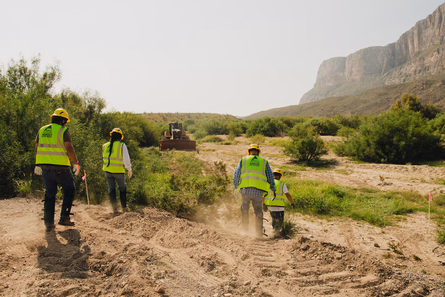 Contractors for U.S. Customs and Border Protection clear land for future patrol roads on Friday near Santa Elena Canyon in Big Bend National Park in Texas. (Natalie Newman)