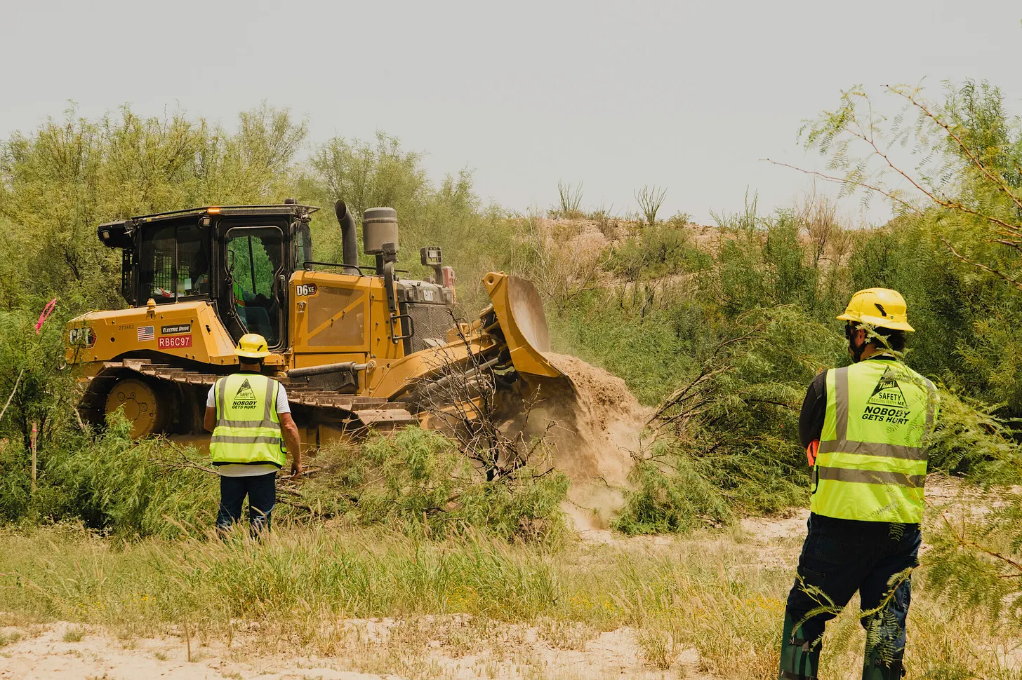 Construction workers and heavy equipment at Big Bend National Park.